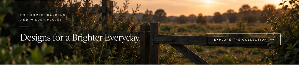Sunset countryside with the words Designs for a Brighter Everyday